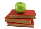 Red books with apple on top
